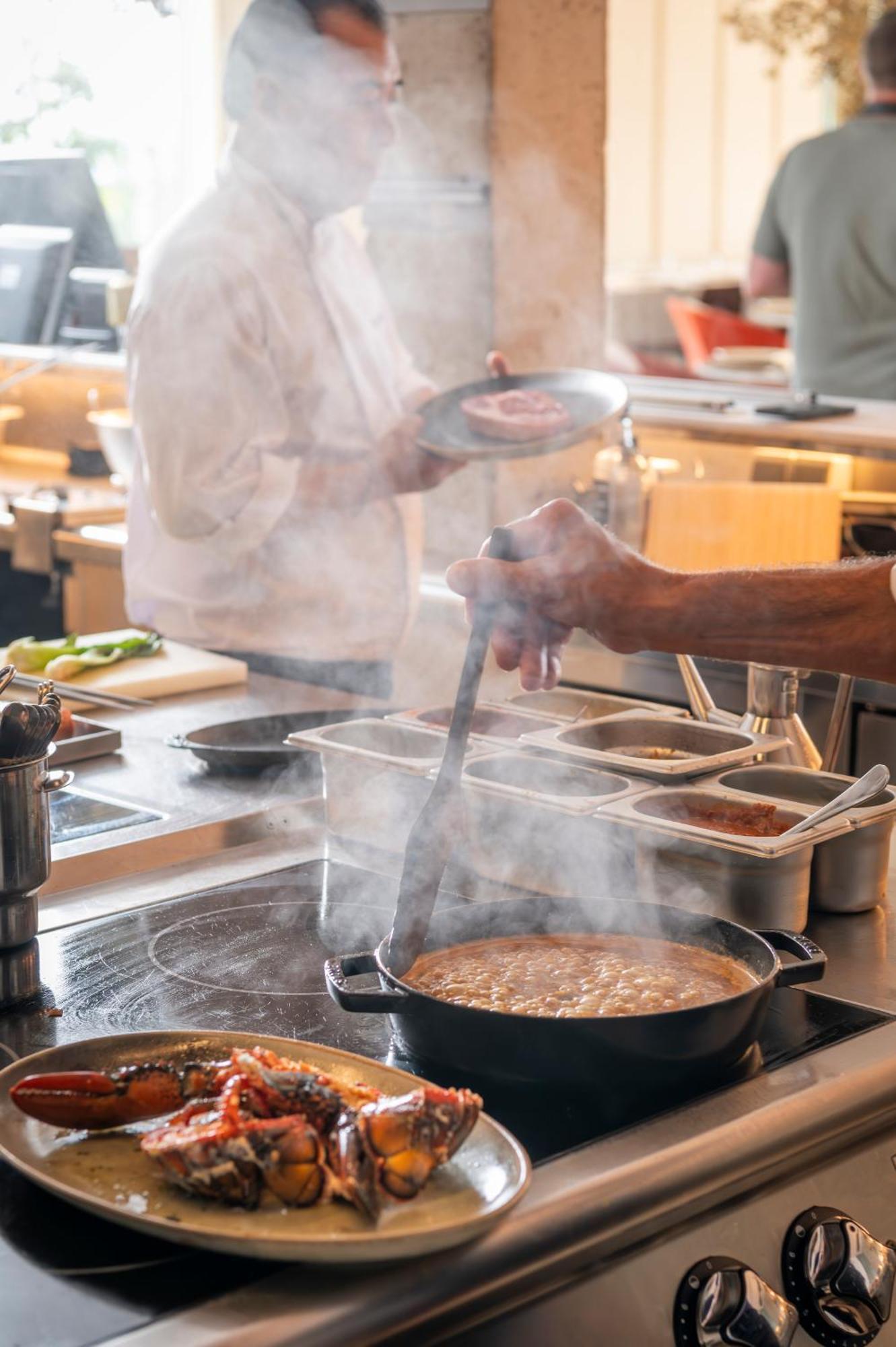 Atzavara Hotel & Spa Santa Susanna Exterior foto A chef stirring a pot of soup